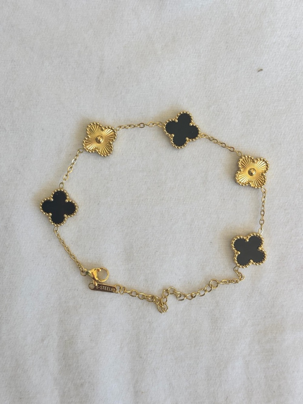 Gold and Black Clover Motif Bracelet